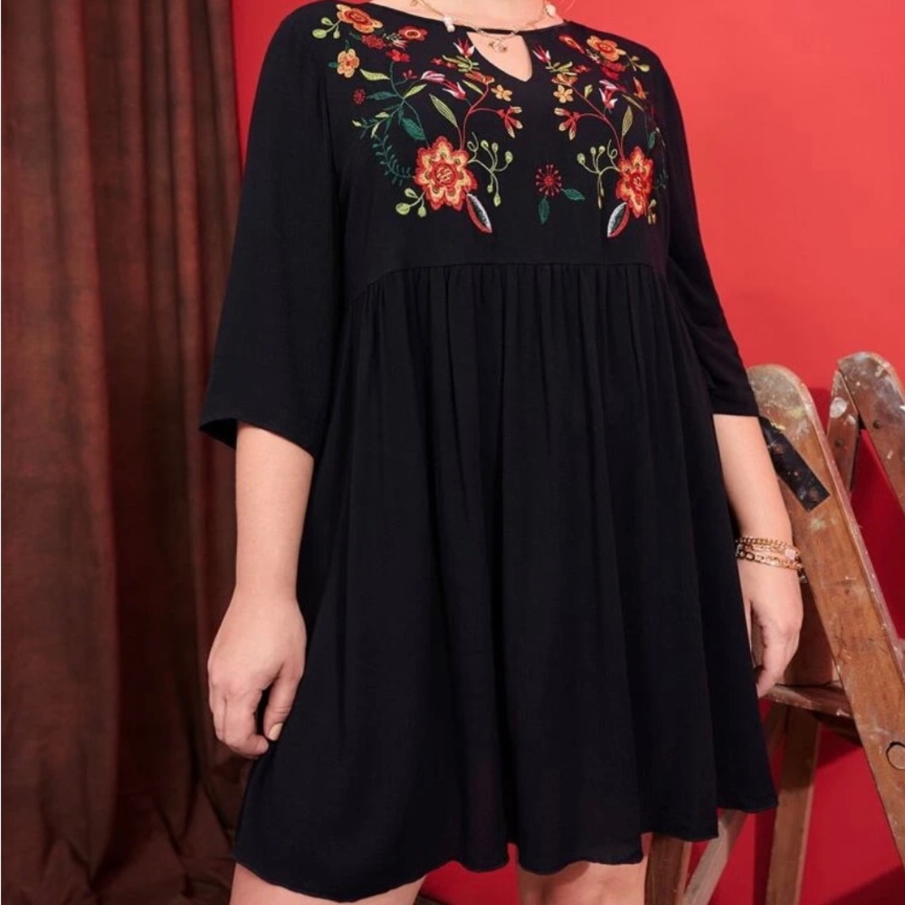 Black babydoll dress with embroidery